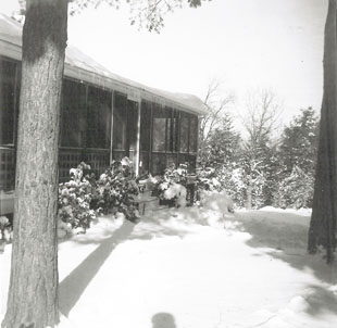 The front of the house on a snowy day in February.